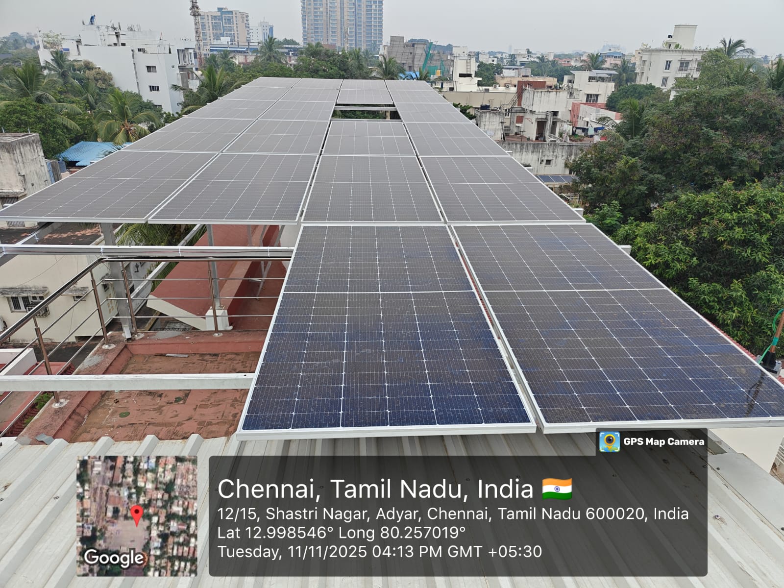 Solar panel installation at Shastri Nagar, Adyar, Chennai — elevated rooftop array on a terrace canopy.