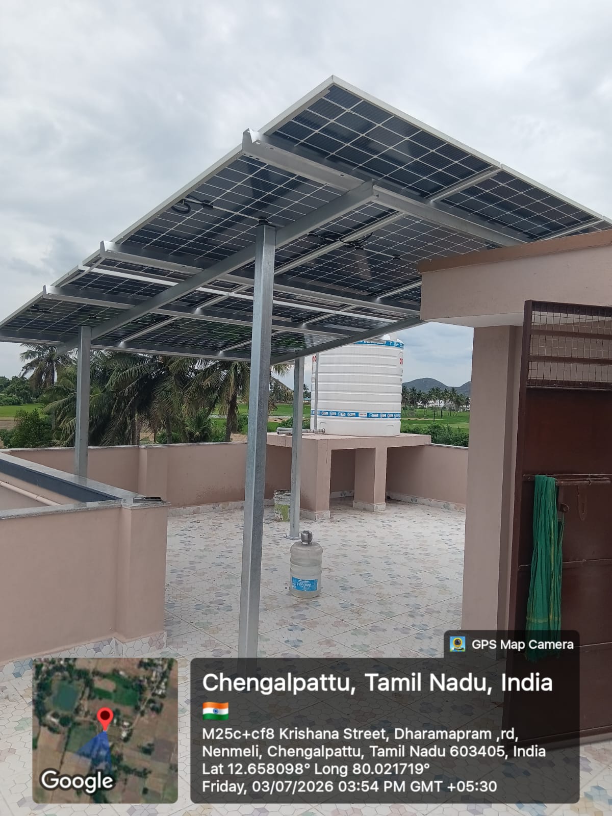 Solar installation at Nenmeli, Chengalpattu — twin-row elevated rooftop canopy.