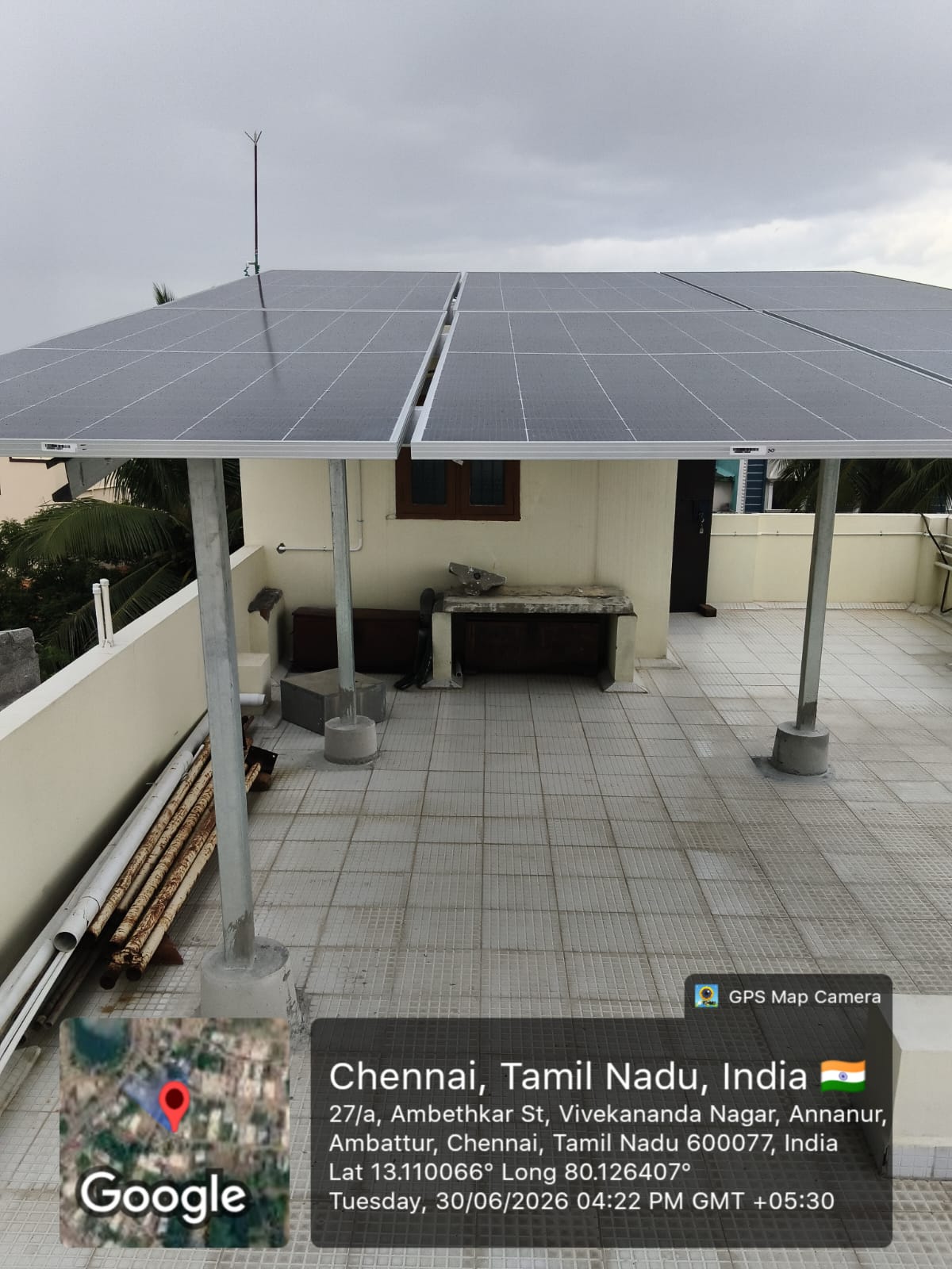 Solar installation at Annanur, Ambattur — large elevated rooftop solar array.