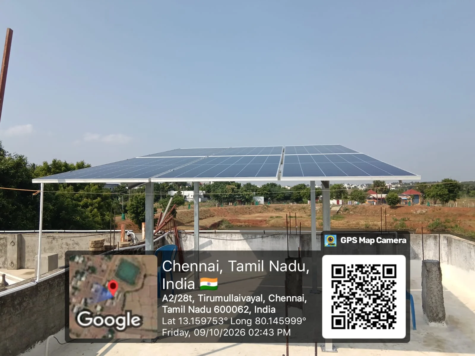 Solar panel installation on a raised rooftop structure at Tirumullaivoyal, Ambattur, Chennai — residential solar power system by Gensolar Energy Pvt Ltd, photographed 9 October 2026.