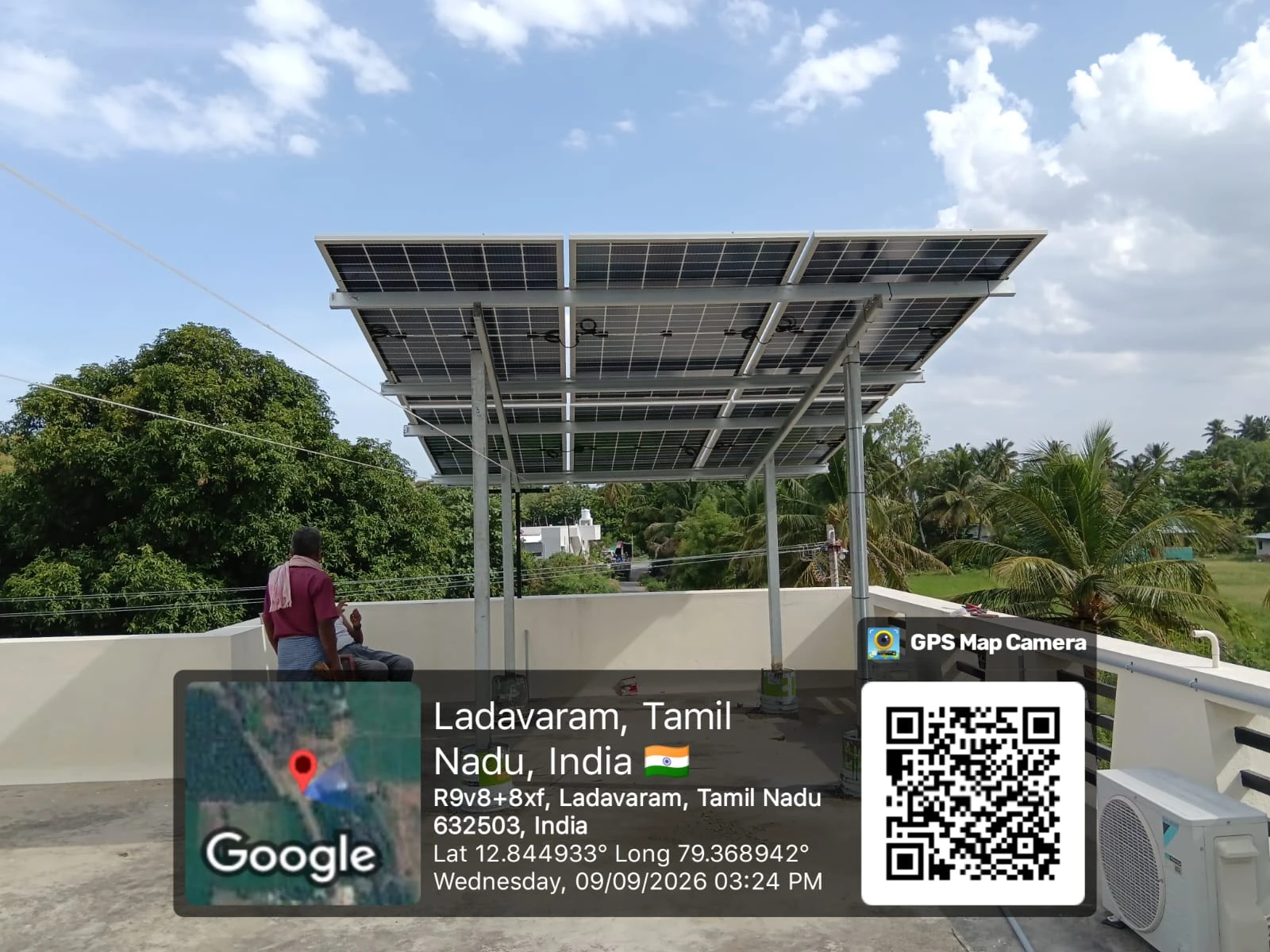 Completed elevated rooftop solar array with homeowner at Ladavaram, Tirupattur, Tamil Nadu — residential solar installation by Gensolar Energy Pvt Ltd, photographed 9 September 2026.