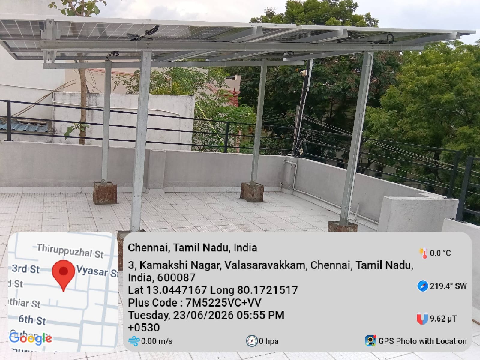 Solar installation at Valasaravakkam, Chennai — galvanised elevated shed structure.