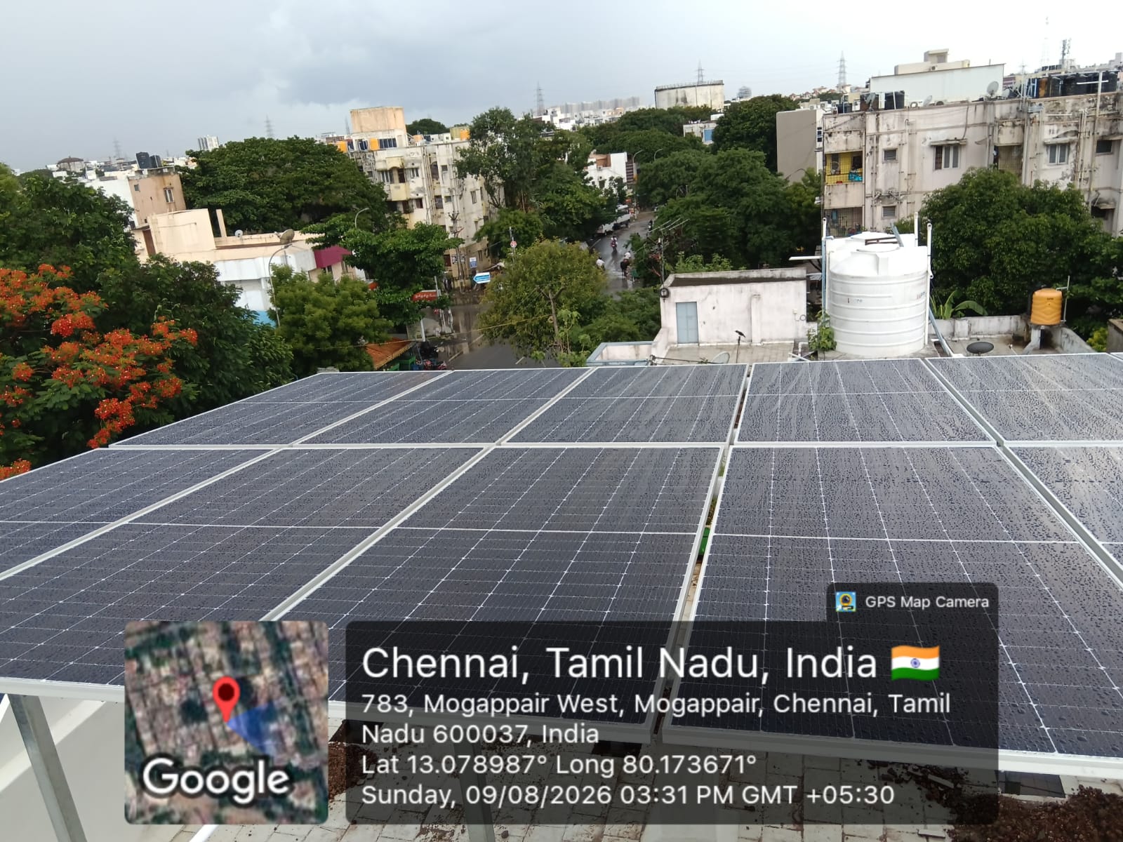 Geo-tagged rooftop solar array at Mogappair West, Chennai — panel view photographed 9 August 2026.
