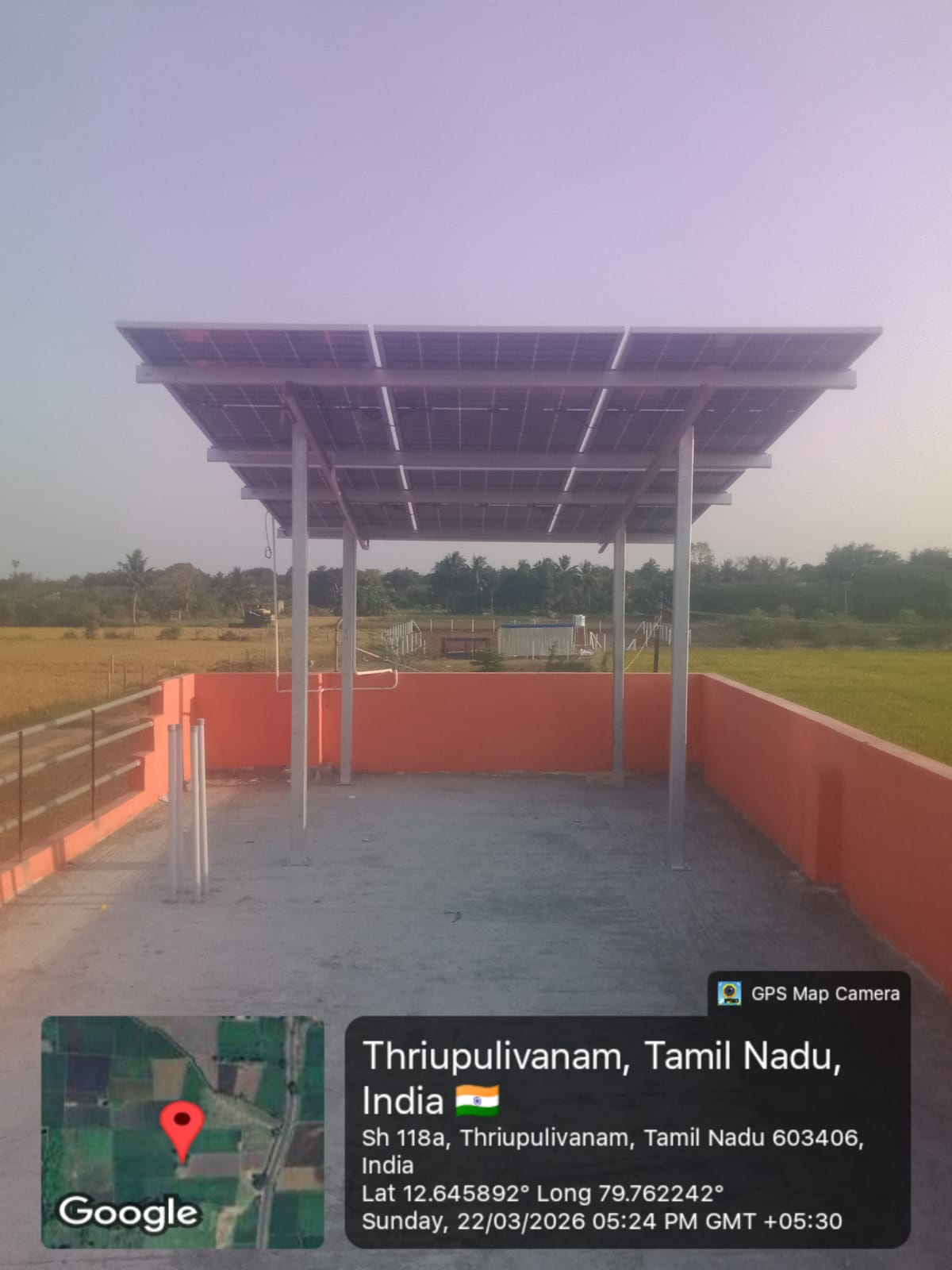 Solar installation at Thriupulivanam, Tamil Nadu — elevated terrace canopy array.