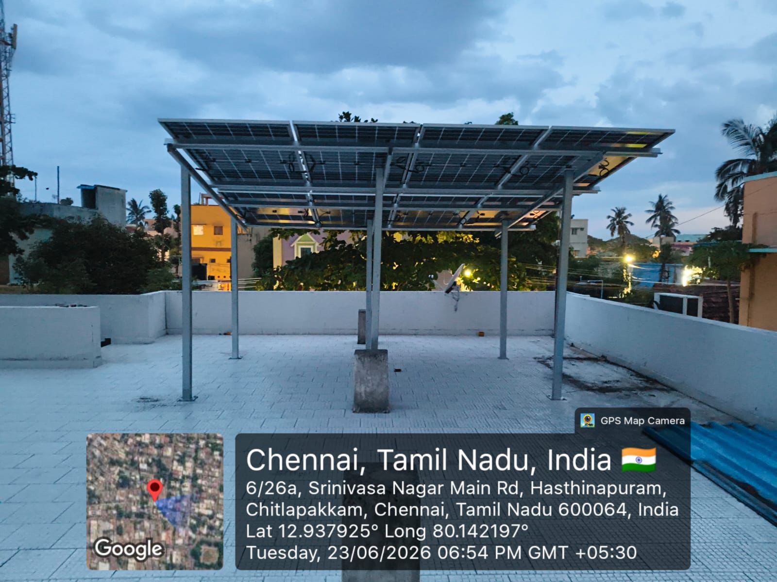 Solar installation at Hasthinapuram, Chennai — elevated rooftop array on terrace.