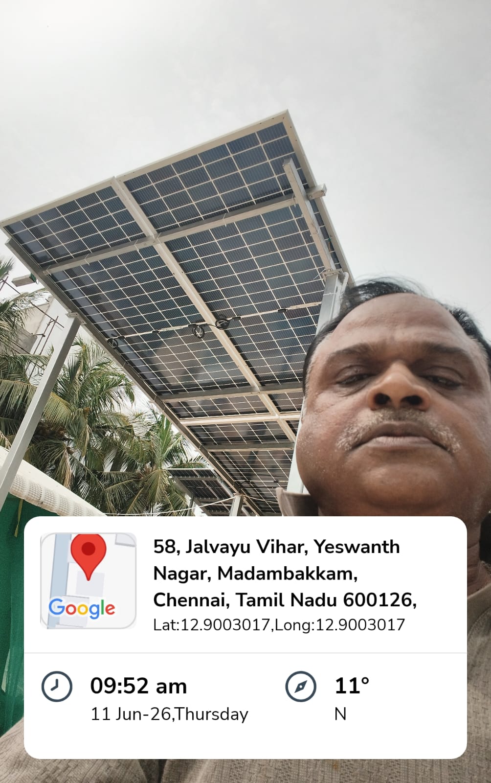 Solar installation at Jalvayu Vihar, Madambakkam — high-clearance rooftop solar canopy.