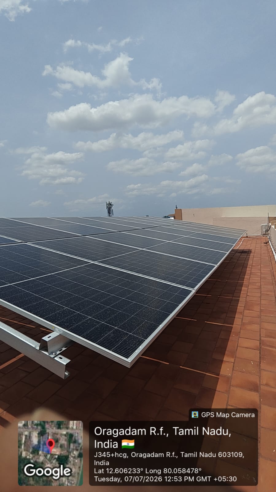 Solar panel installation at Oragadam R.f., Chengalpattu — wide view across the terrace array.