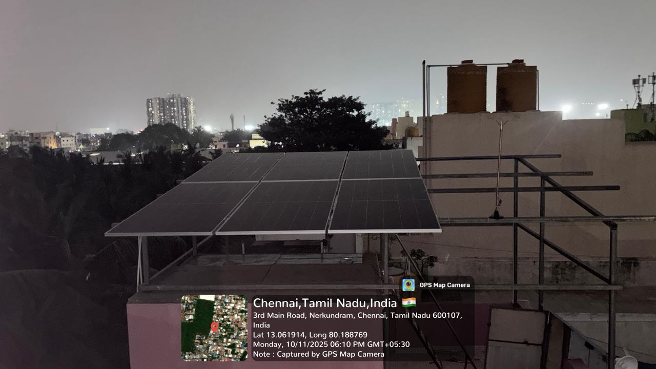 Solar panel installation at Nerkundram, Chennai — rooftop array on raised mounting structure.