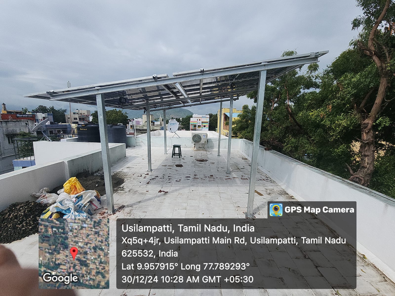 Solar panel installation at Usilampatti, Madurai district, Tamil Nadu — elevated terrace array by Gensolar Energy Pvt Ltd.