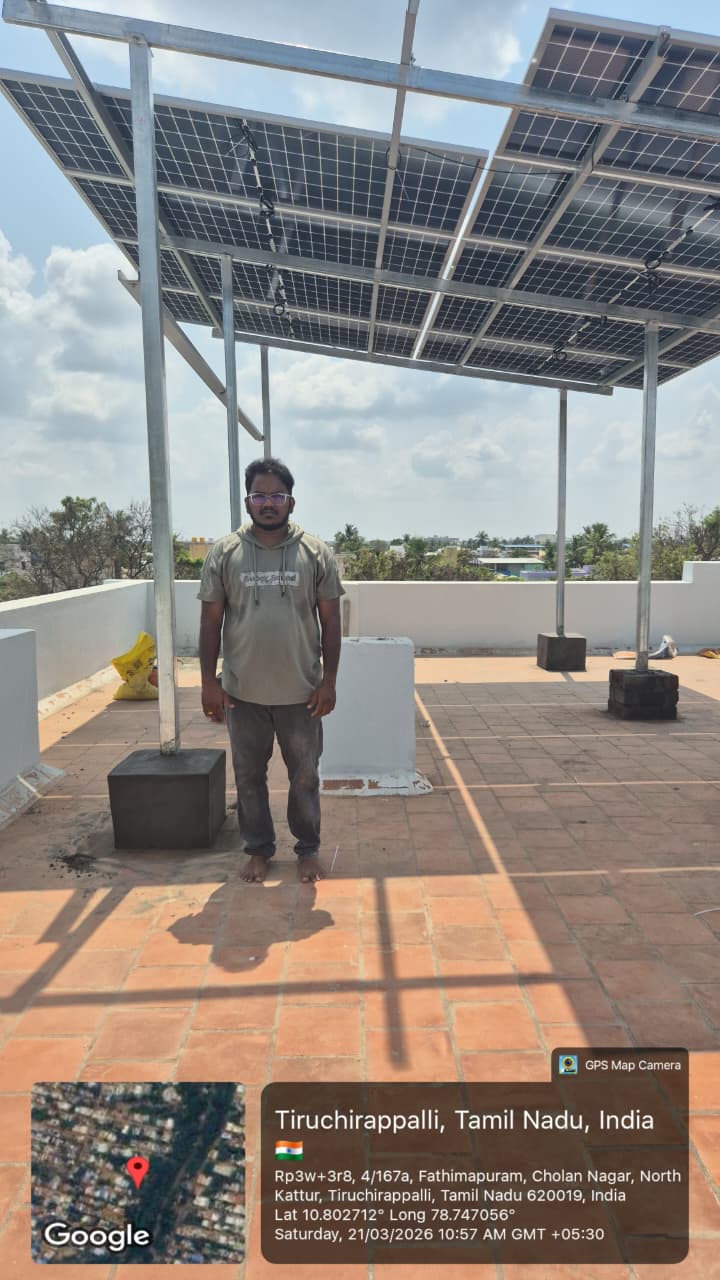 Solar installation at Cholan Nagar, Tiruchirappalli — elevated terrace canopy array.