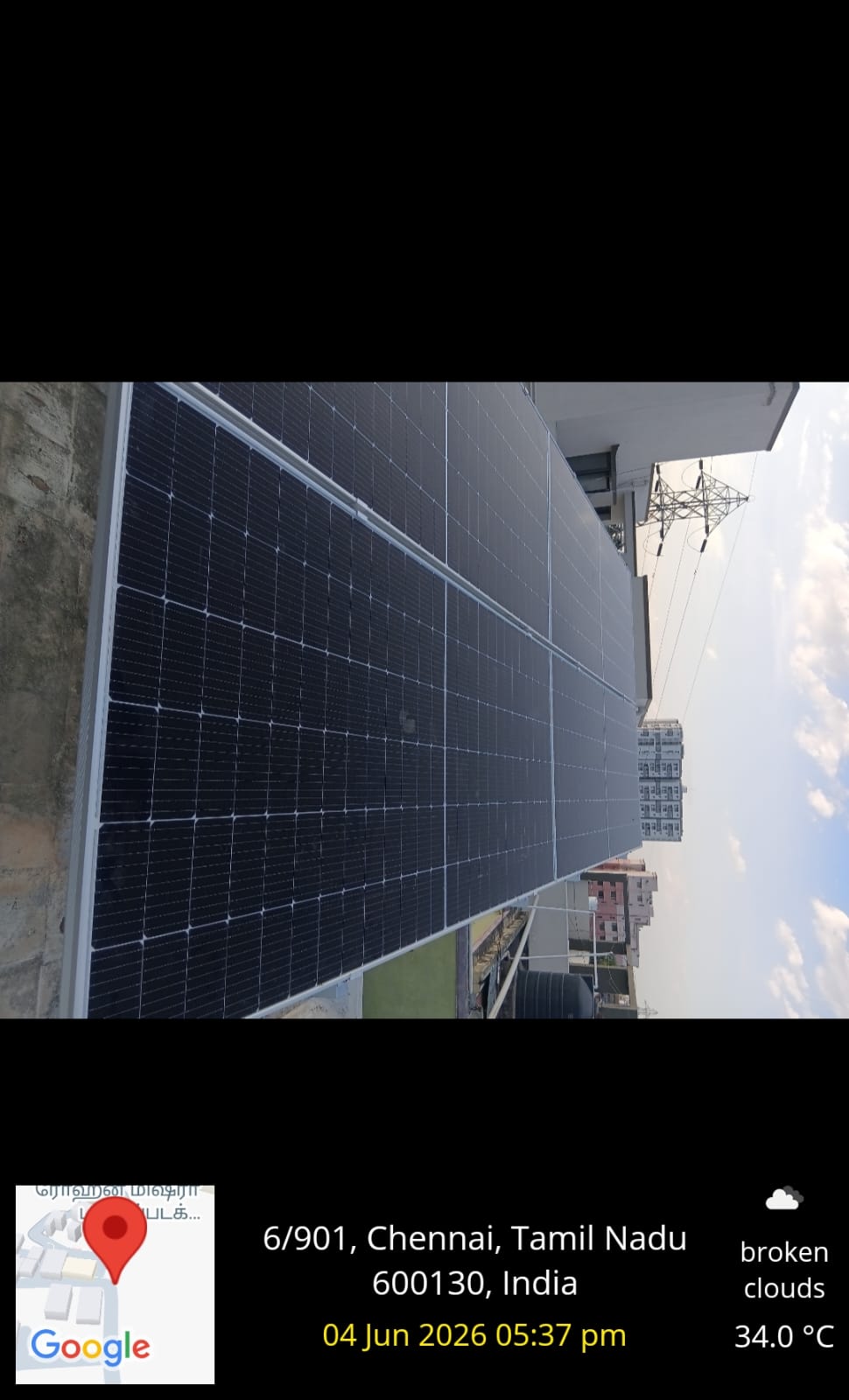 Solar installation at Navalur, Chennai — large rooftop array on an industrial shed.