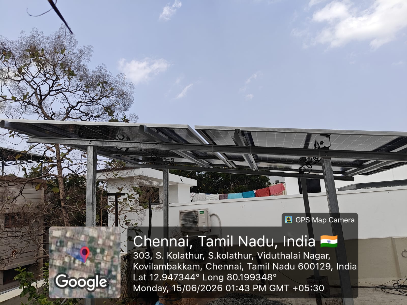 Solar installation at S. Kolathur, Chennai — twin-row elevated rooftop array.