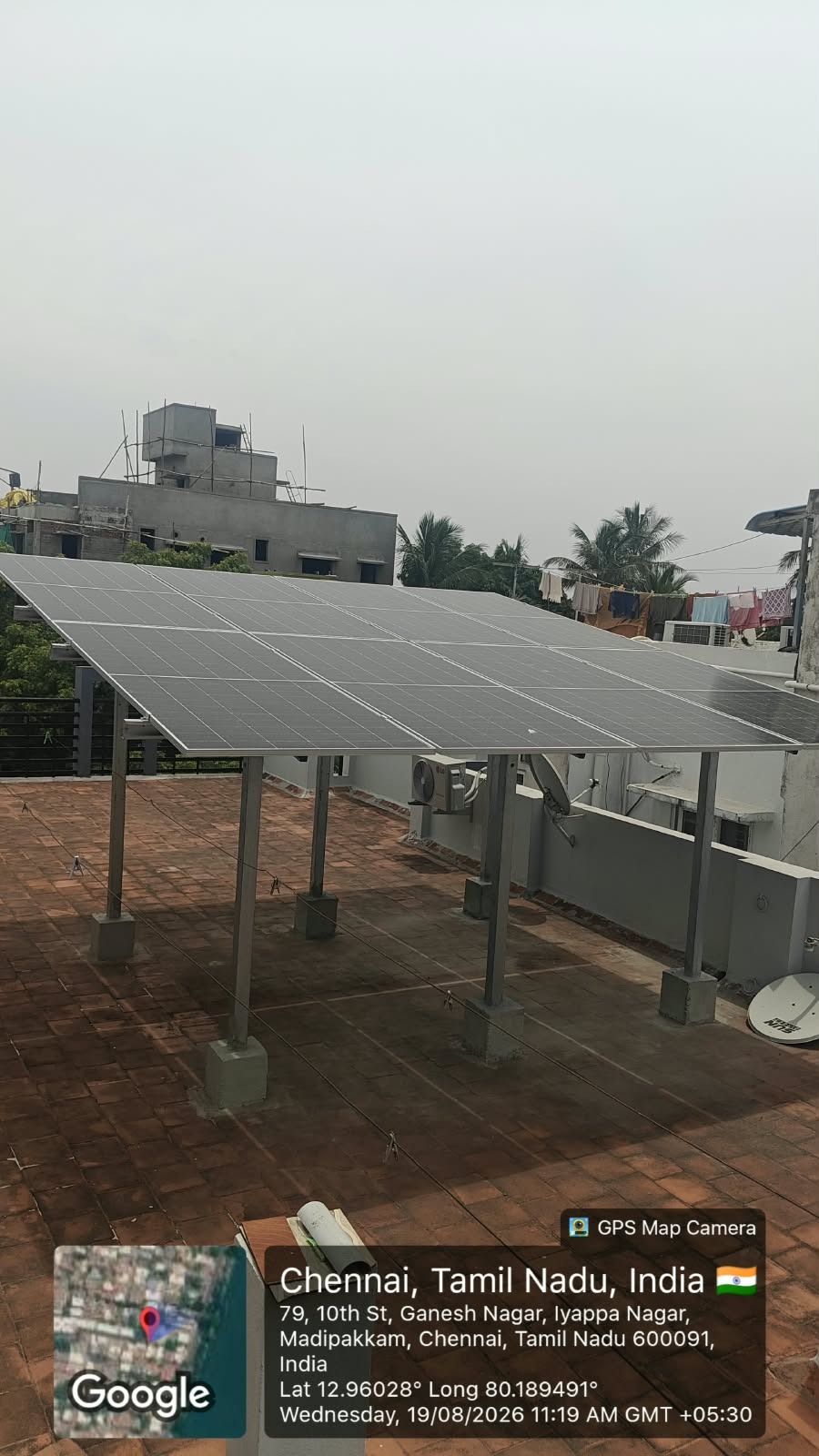 Geo-tagged elevated rooftop solar installation at Ganesh Nagar, Madipakkam, Chennai — photographed 19 August 2026.