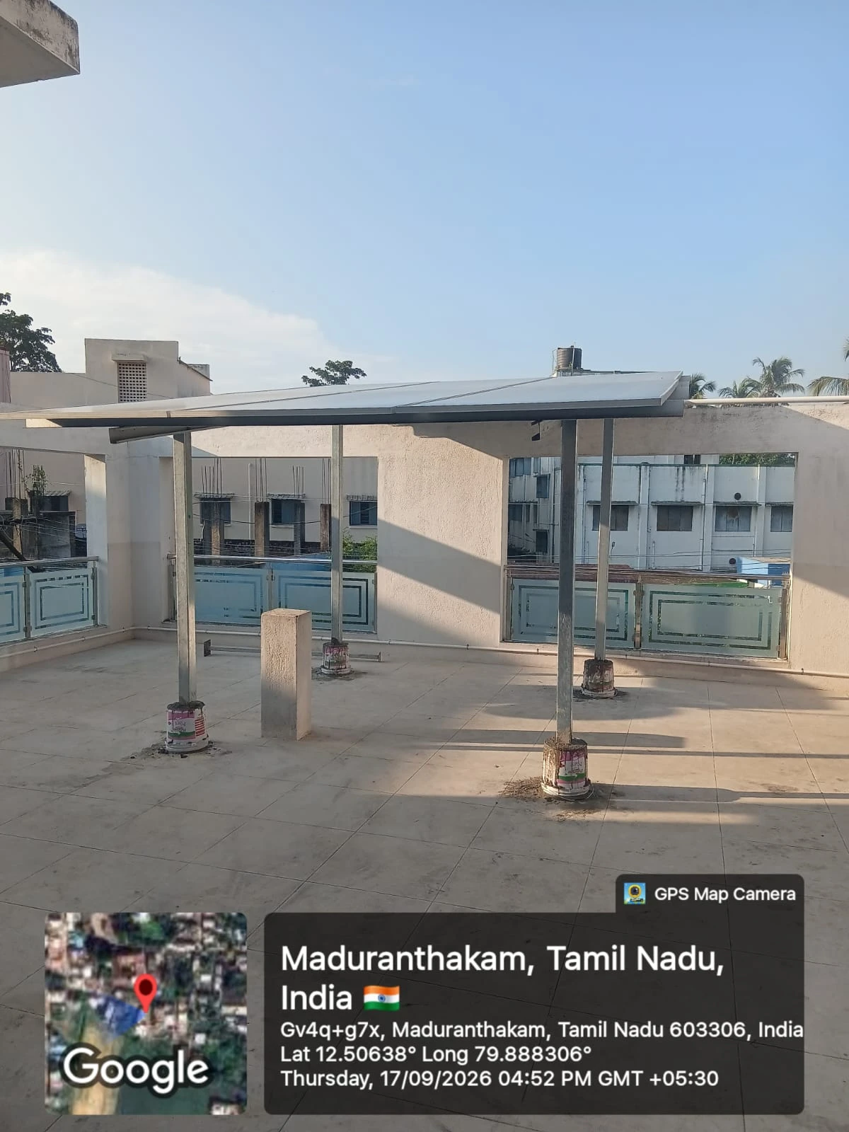 Elevated solar mounting structure base work at Maduranthakam, Chengalpattu district — rooftop solar installation by Gensolar Energy Pvt Ltd, photographed 17 September 2026.