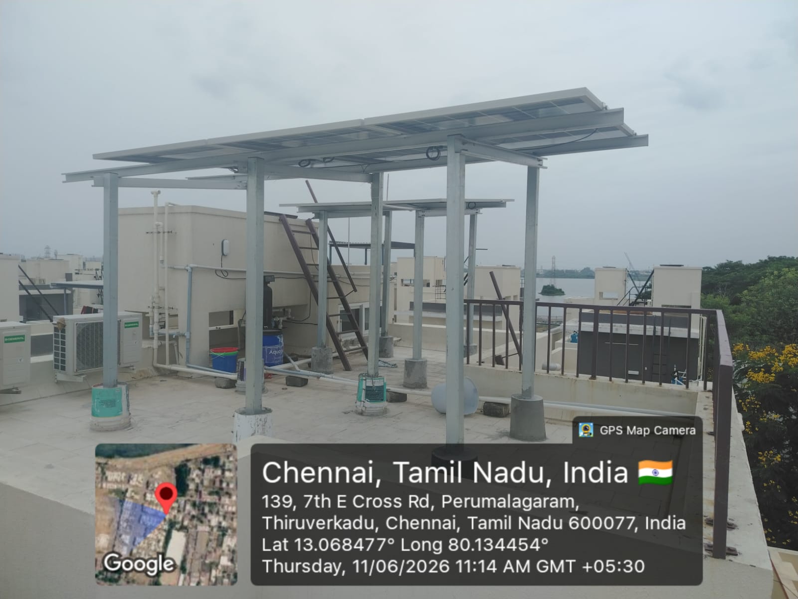Solar installation at Perumalagaram, Thiruverkadu — twin-bay elevated solar canopy.